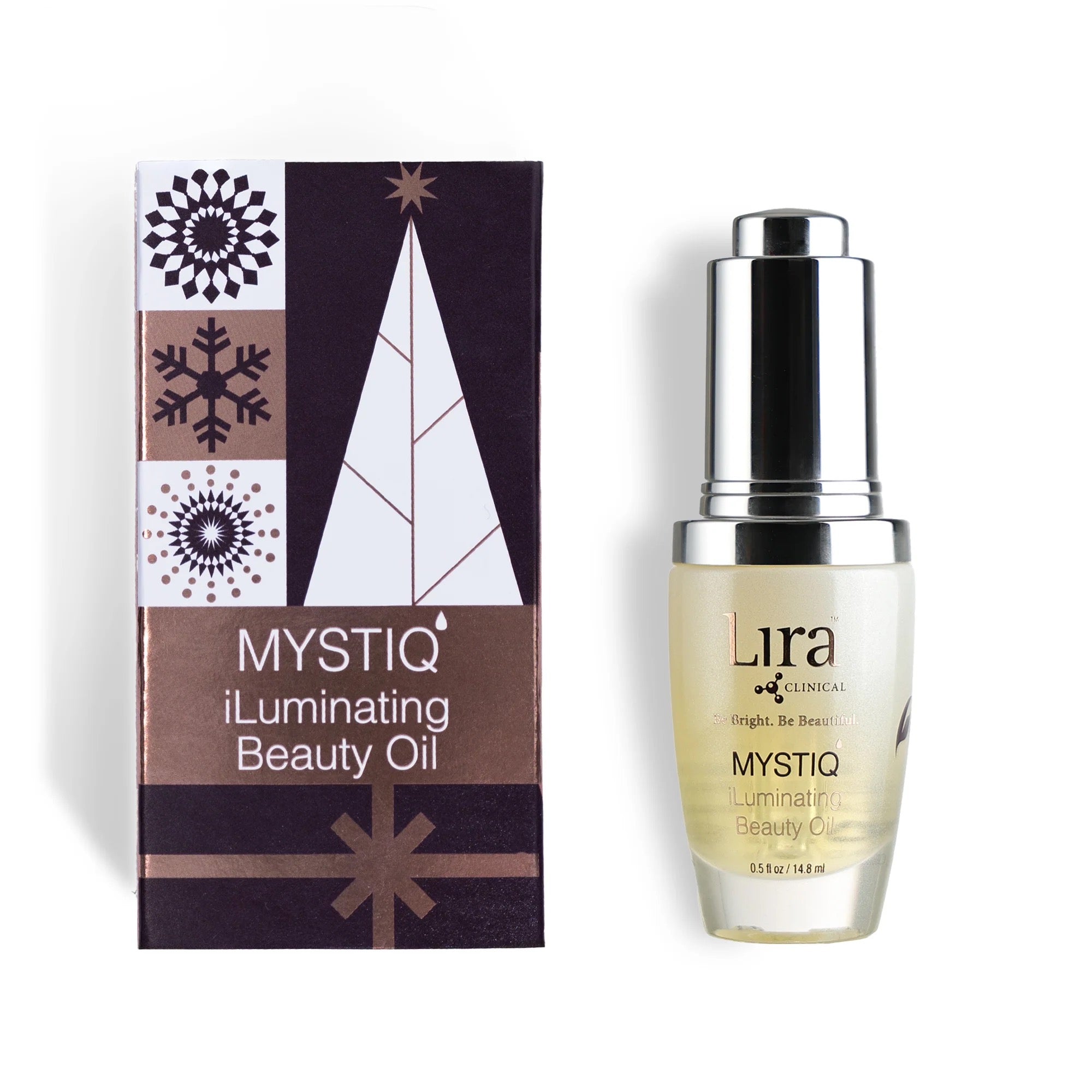 Mystiq illuminating beauty oil bottle and packaging on a white background
