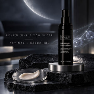 Revision Skincare D-E-J Night Face Cream bottle displayed on a metallic stand with a dollop of cream in a small dish, set on dark stone against a moody dark background with a moon and glowing orb graphics.